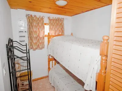 Un ou plusieurs lits dans un hébergement de l'établissement Riverside Home in Folelli