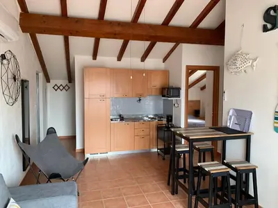 Cuisine ou kitchenette dans l'établissement Les pieds dans l'eau en Corse !
