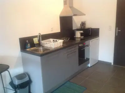 Cuisine ou kitchenette dans l'établissement charmant studio dans résidence neuve et calme