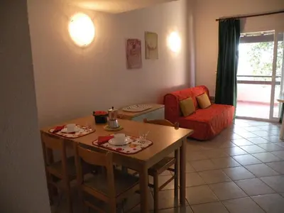 Coin salon dans l'établissement Residence de Tourisme Marina Corsa