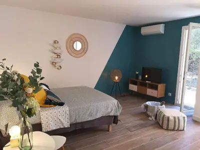 Coin salon dans l'établissement Grand studio 35m2 centre ville