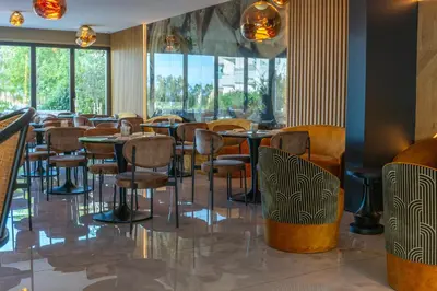 Restaurant ou autre lieu de restauration dans l'établissement Calvi Hôtel