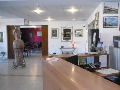 Télévision ou salle de divertissement dans l'établissement Hôtel Sampiero