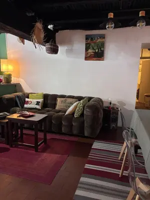Coin salon dans l'établissement Maison de village