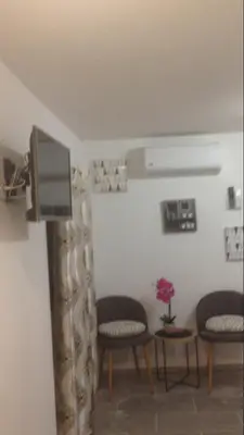 Télévision ou salle de divertissement dans l'établissement Casa di Emma