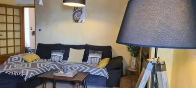 Coin salon dans l'établissement maison de village T4