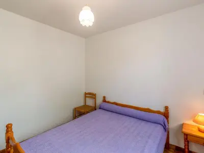 Un ou plusieurs lits dans un hébergement de l'établissement Apartment Dami II-1 by Interhome