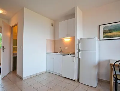 Cuisine ou kitchenette dans l'établissement Résidence Suarella