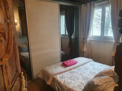 Un ou plusieurs lits dans un hébergement de l'établissement maison de charme avec piscine et vue exceptionnelle
