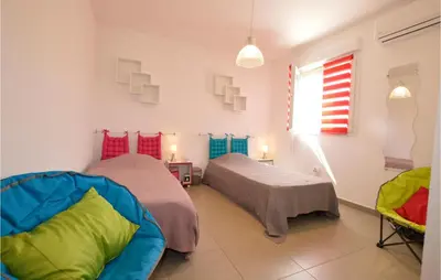Un ou plusieurs lits dans un hébergement de l'établissement Amazing Apartment In Moriani Plage