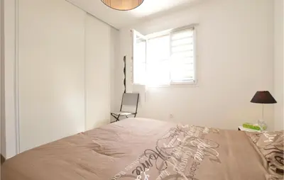 Un ou plusieurs lits dans un hébergement de l'établissement Amazing Apartment In Moriani Plage