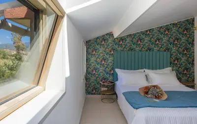 Un ou plusieurs lits dans un hébergement de l'établissement Hôtel & Résidence San Roccu