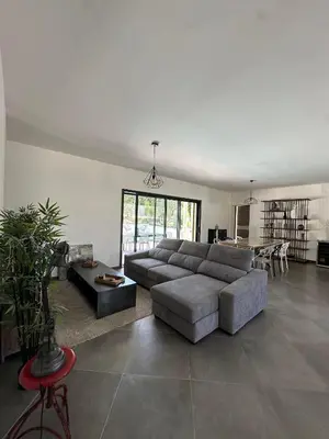 Coin salon dans l'établissement VILLA BENOA
