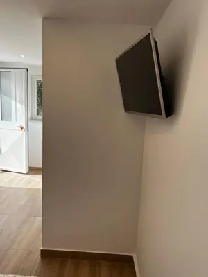 Télévision ou salle de divertissement dans l'établissement Casa Julie