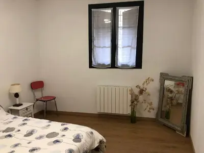 Un ou plusieurs lits dans un hébergement de l'établissement Maison au centre d'un village typique