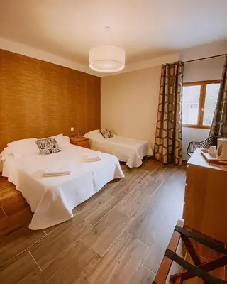 Un ou plusieurs lits dans un hébergement de l'établissement Auberge De La Foret Bonifatu