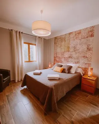 Un ou plusieurs lits dans un hébergement de l'établissement Auberge De La Foret Bonifatu
