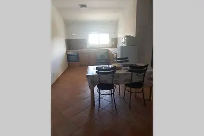 Cuisine ou kitchenette dans l'établissement appartement tra mare e monti