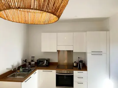 Cuisine ou kitchenette dans l'établissement Résidence Casarella Lama