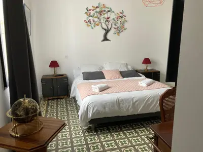 Un ou plusieurs lits dans un hébergement de l'établissement Hôtel La Demeure Coloniale