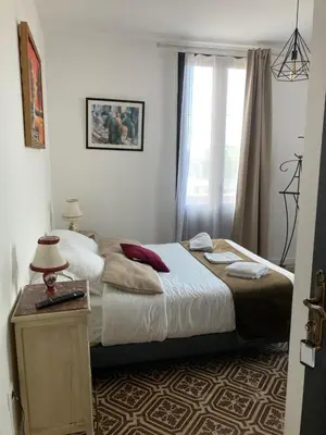 Un ou plusieurs lits dans un hébergement de l'établissement Hôtel La Demeure Coloniale