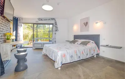 Un ou plusieurs lits dans un hébergement de l'établissement Corse et Zen BULLE ZEN 25 m² 2 pers + Bébé