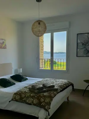 Un ou plusieurs lits dans un hébergement de l'établissement Appartement COCON vue mer