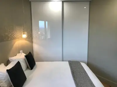 Un ou plusieurs lits dans un hébergement de l'établissement Appartements de Standing - Panate
