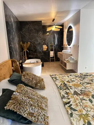 Un ou plusieurs lits dans un hébergement de l'établissement Casaceccu suite Vespa