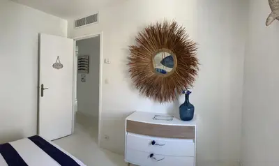 Un ou plusieurs lits dans un hébergement de l'établissement Les galets bleus de Calvi