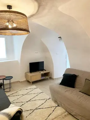 Télévision ou salle de divertissement dans l'établissement CASA A CERTOSA au cœur de la Citadelle