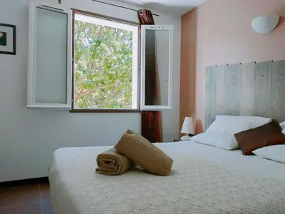 Un ou plusieurs lits dans un hébergement de l'établissement auberge de tesa