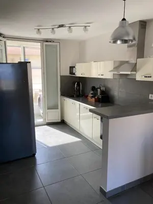 Cuisine ou kitchenette dans l'établissement Appartement Bastia Centre