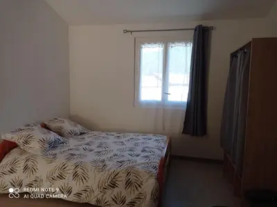 Un ou plusieurs lits dans un hébergement de l'établissement Maisonnette U Santu Ghjuvandria ou A Santa Ghjulia entre mer et Montagne
