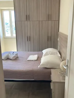 Un ou plusieurs lits dans un hébergement de l'établissement DUPLEX 4 PERSONNES Clim Wifi Parking