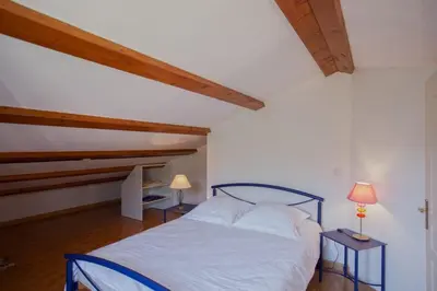 Un ou plusieurs lits dans un hébergement de l'établissement Casa Catarelli