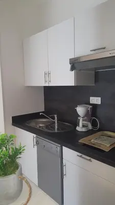 Cuisine ou kitchenette dans l'établissement Residence Arinella