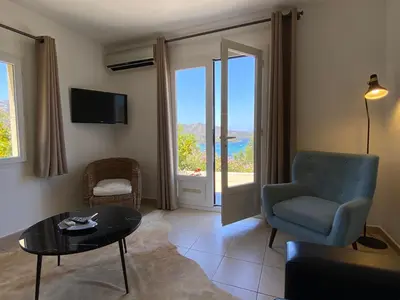 Télévision ou salle de divertissement dans l'établissement La Citadelle Appartements