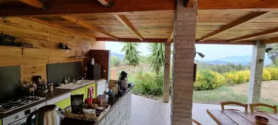Cuisine ou kitchenette dans l'établissement Le Clos des Milans