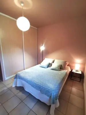 Un ou plusieurs lits dans un hébergement de l'établissement Casa Galli- Belle villa coeur de ville avc piscine