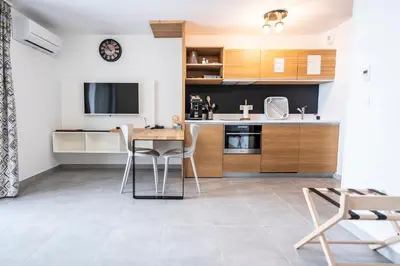 Cuisine ou kitchenette dans l'établissement hôtel résidence a torra