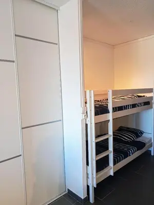Un ou plusieurs lits dans un hébergement de l'établissement studio à 100m de la plage et de la piscine