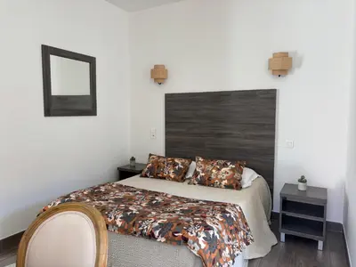 Un ou plusieurs lits dans un hébergement de l'établissement Hotel U Campanile