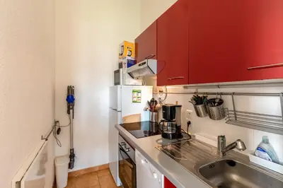 Cuisine ou kitchenette dans l'établissement Le Monti