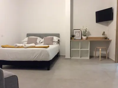 Un ou plusieurs lits dans un hébergement de l'établissement STUDIO A 2 MIN DES PLAGES