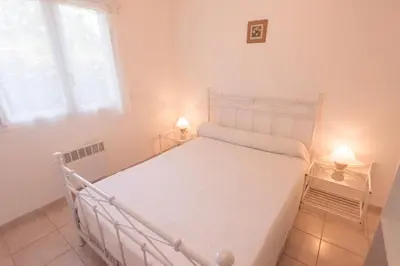 Un ou plusieurs lits dans un hébergement de l'établissement Residence de tourisme Le clos des Vendanges