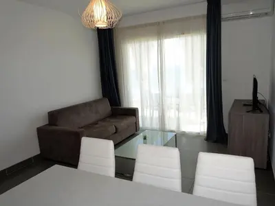 Coin salon dans l'établissement Apartment T3 vue baie by Interhome