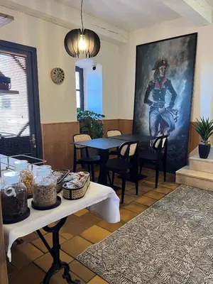 Coin salon dans l'établissement Hôtel Posta Vecchia