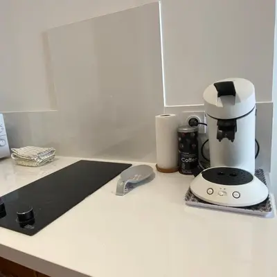 Cuisine ou kitchenette dans l'établissement Belle chambre d hôte Et cuisine hyper centre