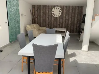 Coin salon dans l'établissement VILLA OCEANE